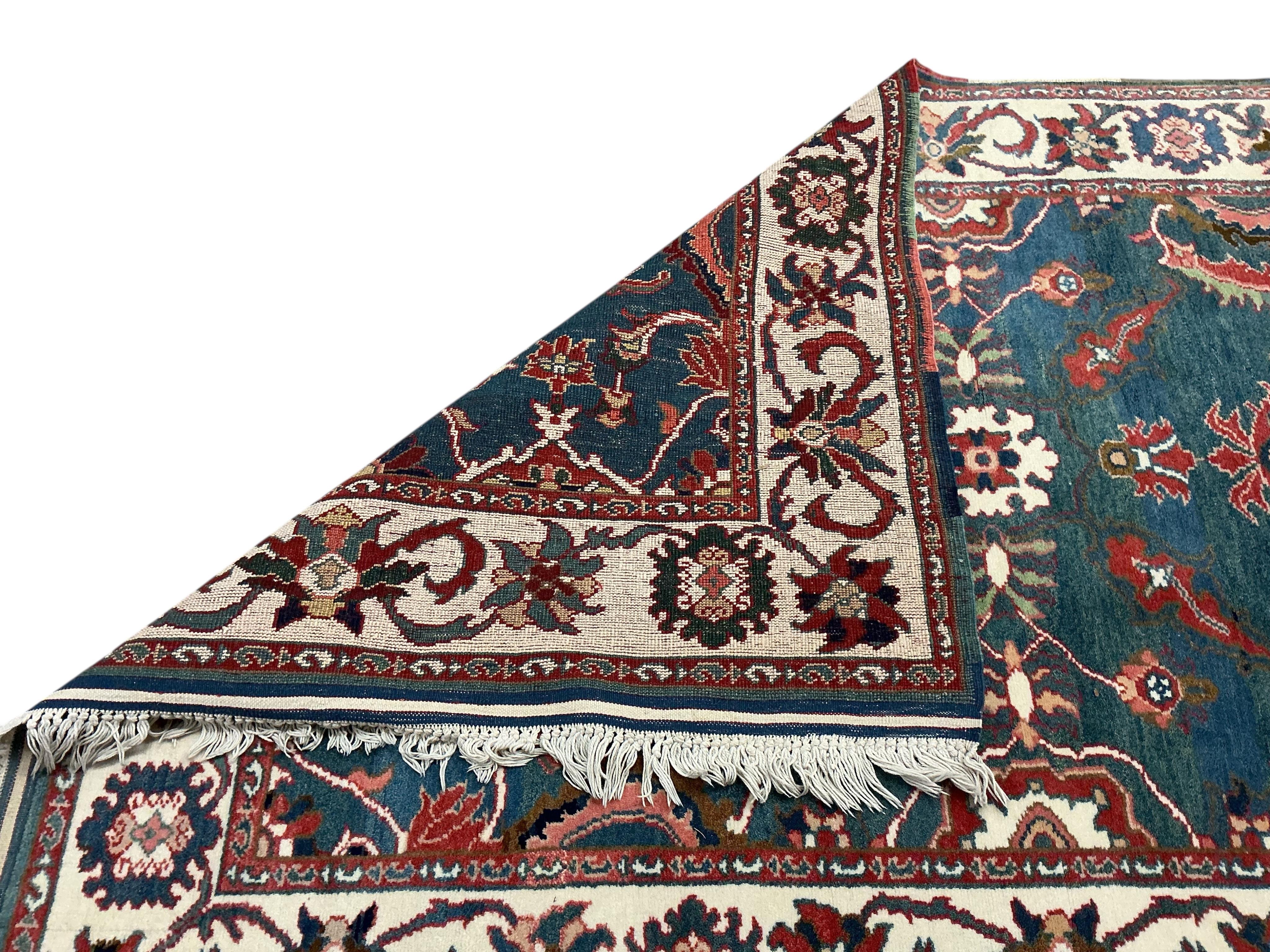 A Tabriz blue ground rug, 204 x 134cm.